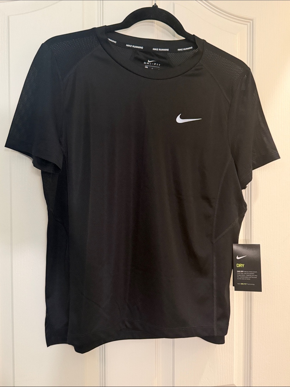 Nike woman’s Black Dri-FIT Short Sleeve Running Shirt